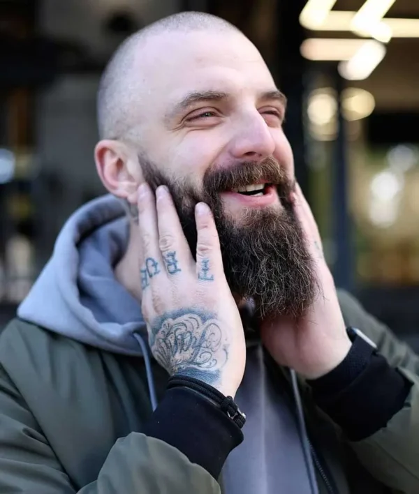 Beard massage by hand — proper application of Scissor Hands beard balm.
